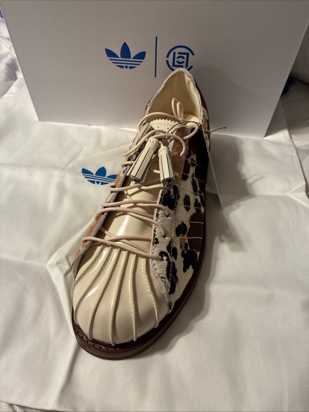 Adidas unisex superstar dress shoe clot by Edison Chen cow print sz m9/ladies 10
